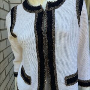 St. John Couture knit cardigan featuring contrast trim and a jewel neck